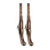 A fine pair of southern German percussion pistols with chiseled mounts, circa 1780