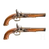 A pair of German flintlock pistols with silver and gold inlays, circa 1800