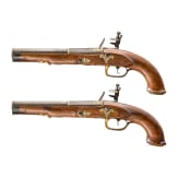 A pair of German flintlock pistols with silver and gold inlays, circa 1800