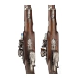 A cased pair of flintlock pistols with a detachable stock, H. W. Mortimer & Co. of London, circa 1810