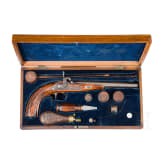 A cased percussion pistol, Ulrich Roos & Sohn, Stuttgart, circa 1850