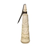 A German silver-mounted powder flask of ivory, mid-19th century