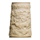 A German silver-mounted powder flask of ivory, mid-19th century