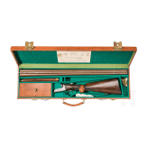 A cased side-by-side shotgun by Woodward & Son