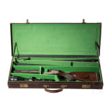 A Merkel double-rifle with Zeiss scope, and a side-by-side shotgun barrel set with case