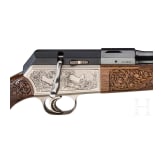 A cased Blaser M SR 850/88 Luxus repeating rifle with interchangeable barrel and Zeiss scope