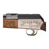 A cased Blaser M SR 850/88 Luxus repeating rifle with interchangeable barrel and Zeiss scope