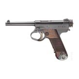 A Nambu Type 14 with large trigger guard and holster