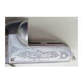 A cased side-by-side shotgun by Woodward & Son
