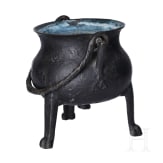 A small German bronze cauldron, dated 1557
