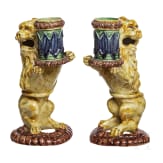 A pair of probably French Fayance lions as a candle holder, 19th century