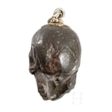 A German memento mori skull made from meteoric stone, 19th century