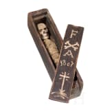 A southern German/Alpine memento mori skeleton in a coffin, dated 1807