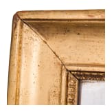 A large carved and originally gilded German neoclassical mirror, circa 1800