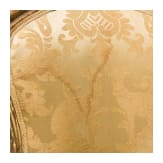 A carved and gilded French Louis XV fauteuil, 18th century