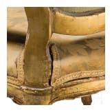 A carved and gilded French Louis XV fauteuil, 18th century
