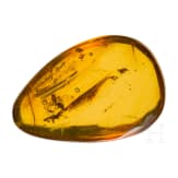 A small amber with inclusions