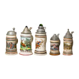 Five motif jugs with tin lids, around 1900
