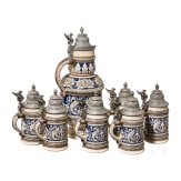 A lidded can with six beer mugs, short before 1900