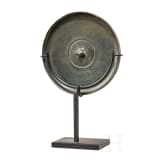 A Chinese bronze mirror, 18th/19th century