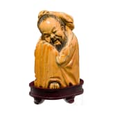 A Chinese figure of a wise man, circa 1900