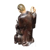Monk with dog, carving in wood and ivory, China, around 1900