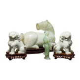 A pair of Chinese lions, a nephrite horse and a nephrite statuette, 20th century