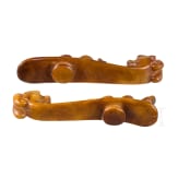 A pair of Chinese jade belt hooks, probably circa 1900 or earlier