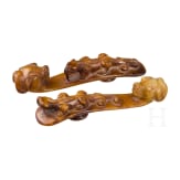 A pair of Chinese jade belt hooks, probably circa 1900 or earlier