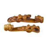 A pair of Chinese jade belt hooks, probably circa 1900 or earlier