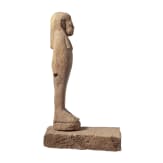 An Egyptian wooden ushabti, 17th/18th dynasty, circa 1500 B.C.