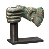 An axe head, Luristan, circa 1000 B.C.