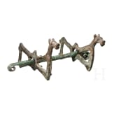 A Luristan bronze snaffle bit, 10th century B.C.