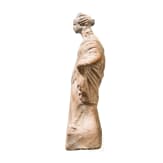 A Greek female terracotta statuette, Magna Graecia, 4th century B.C.