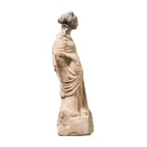 A Greek female terracotta statuette, Magna Graecia, 4th century B.C.