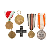 A collection of medals, insignias, documents, 19th/20th century