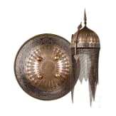 A chiselled and gold-damascened Persian helmet and shield, 19th century