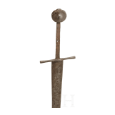 A rare German two-handed battle sword with heavy single-edged blade, circa 1350 – 1400