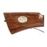 A bone-inlaid German matchlock musket, dated 1610