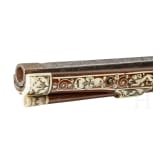 A profusely bone-inlaid wheel-lock arquebus, Teschen, circa 1650