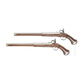 A rare pair of flintlock holster pistols made for superimposed loads, from the armoury of the Princes of Salm-Reifferscheidt-Dyck, northern German or Dutch, circa 1660