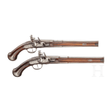 A pair of German over-and-under flintlock pistols, circa 1690/1700