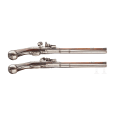 A pair of German over-and-under flintlock pistols, circa 1690/1700