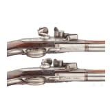 A pair of German over-and-under flintlock pistols, circa 1690/1700