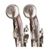 A pair of German over-and-under flintlock pistols, circa 1690/1700