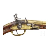 A splendid fire-gilt flintlock pistol by Jean Brion &agrave; Paris, circa 1710