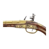 A splendid fire-gilt flintlock pistol by Jean Brion &agrave; Paris, circa 1710