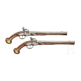A pair of long Flemish breechloading flintlock pistols, circa 1720/30