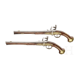 A pair of long Flemish breechloading flintlock pistols, circa 1720/30