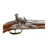 A deluxe German flintlock pistol with fine chiselling, circa 1730